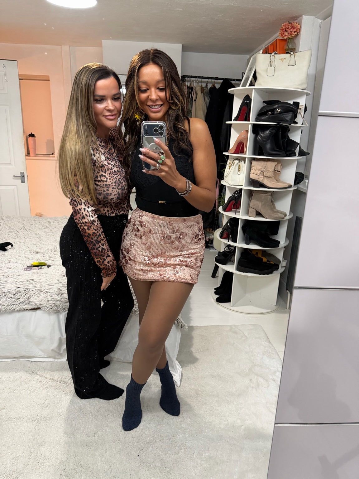 Golden Tan 20 denier nude tights styled with a black lace top and rose sequin mini skirt