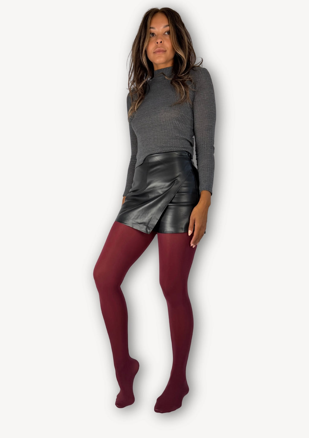 Model wearing WW Selects Luxe Layers 70 denier tights in Cherry Drop