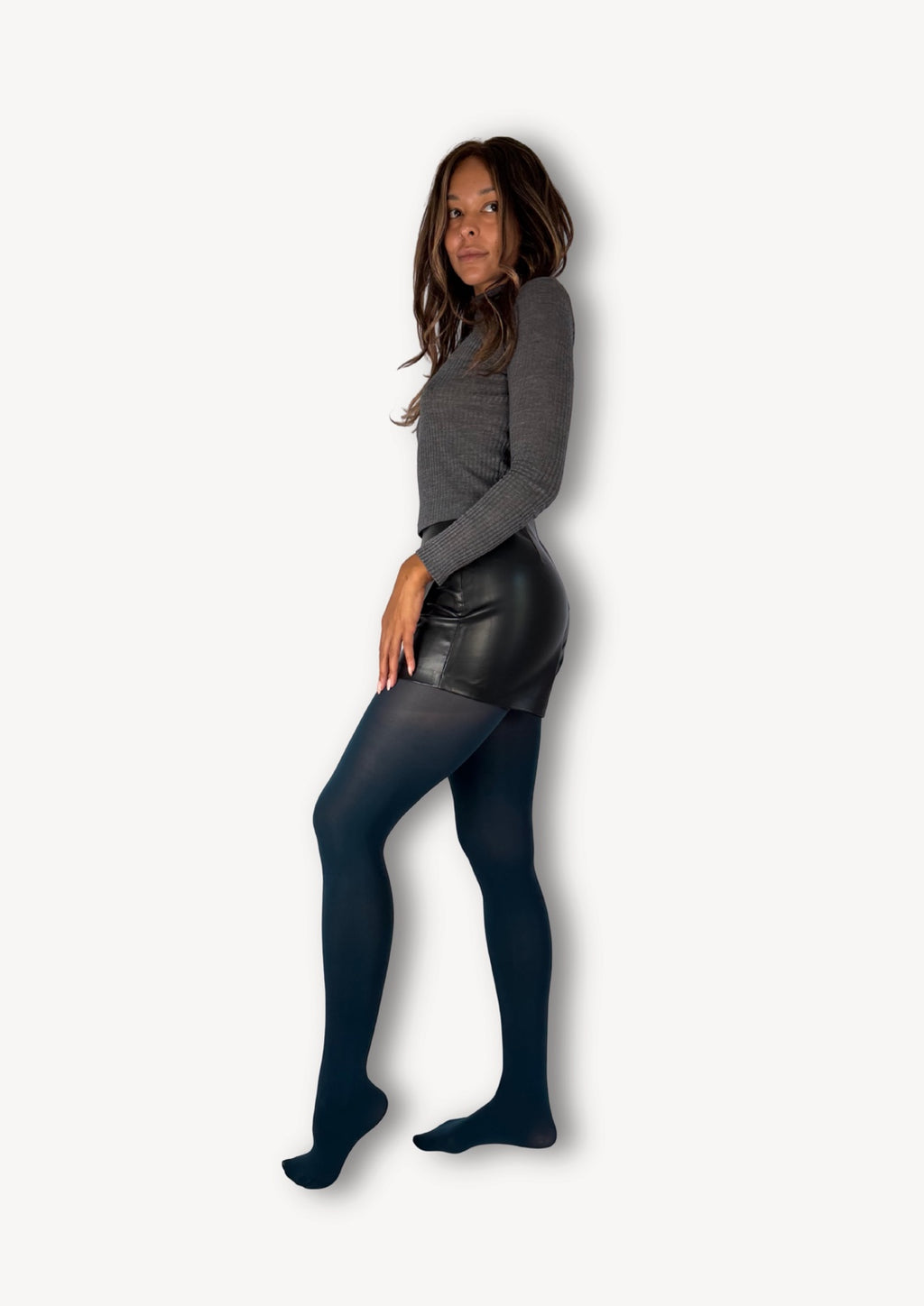 Model wearing WW Selects Luxe Layers 70 denier tights in Teal Transit