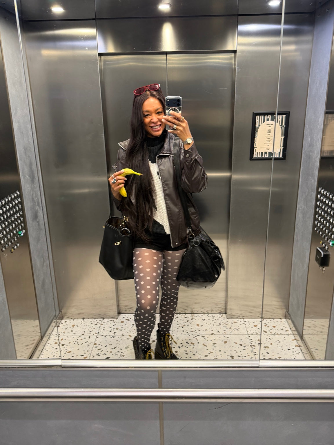 Black and white Polka Dot Printed Tights styled in an elevator