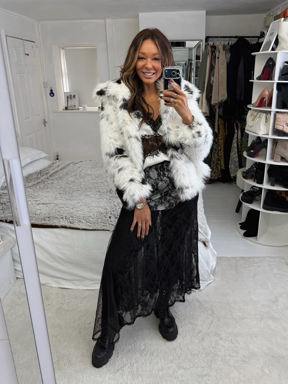Wander Ease 70 black footless tights styled with layered lace, textured outerwear and chunky boots