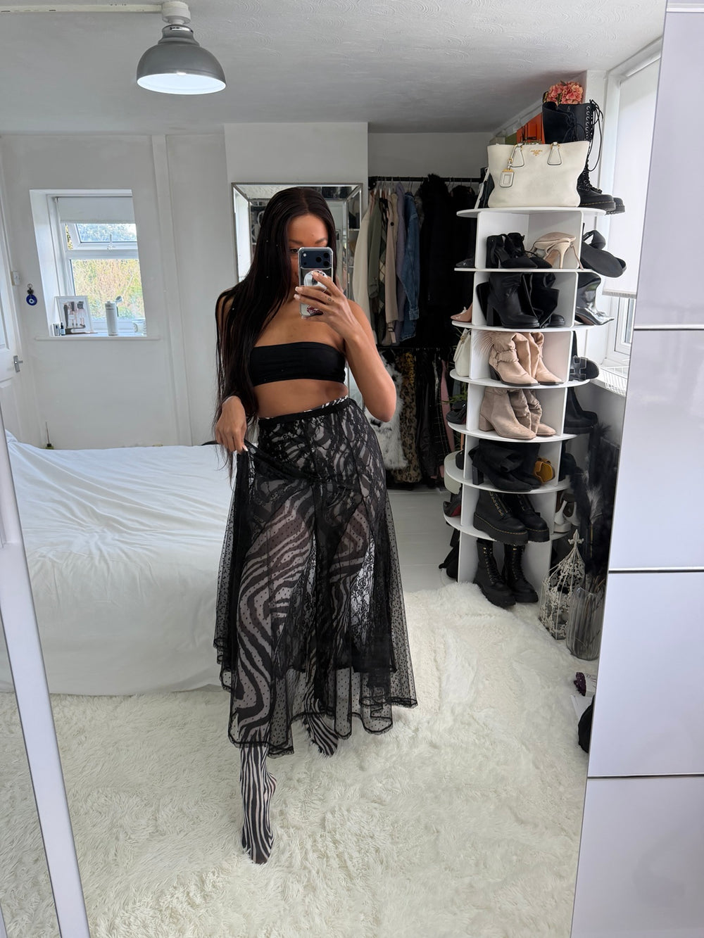 Zebra Printed Tights styled beneath a sheer lace skirt